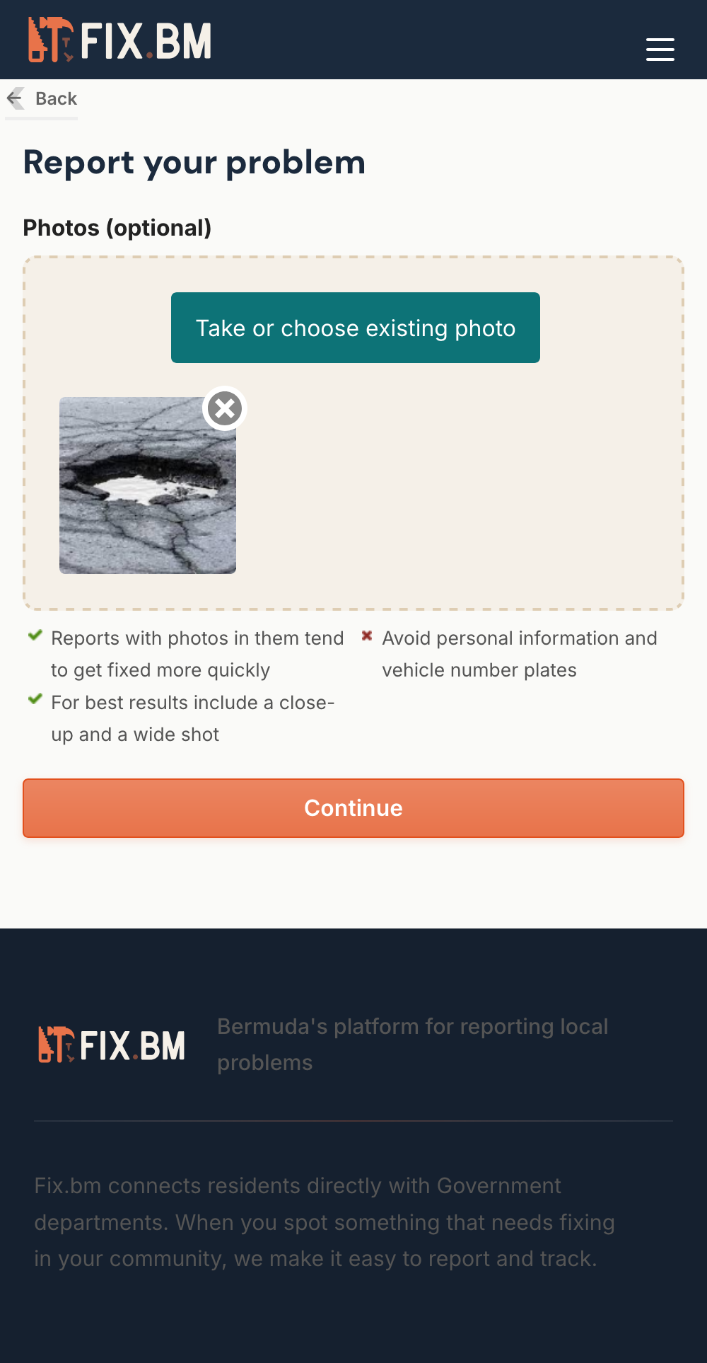 Mobile photo upload showing a pothole photo attached